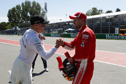 Valtteri Bottas, Mercedes AMG F1, congratulates Sebastian Vettel, Ferrari