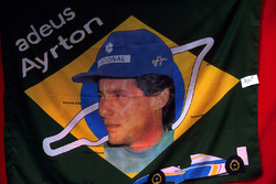 The Ayrton Senna, tribute flag had been manufactured and was ready for sale by the Grand Prix following his tragic death