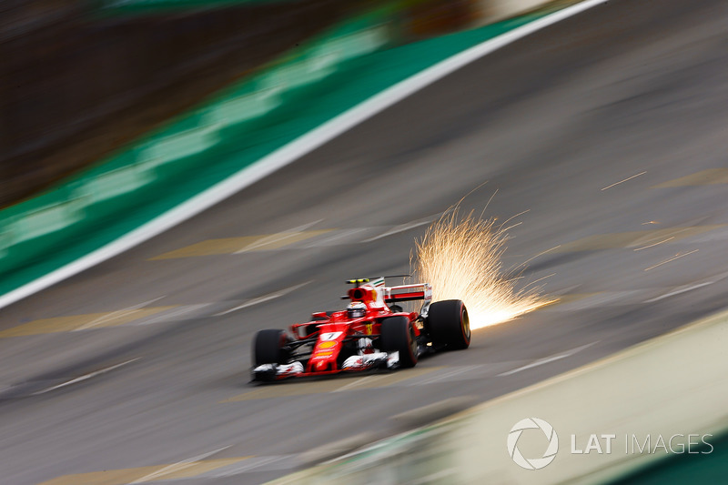 Sparks fly from the car of Kimi Raikkonen, Ferrari SF70H