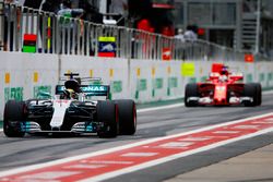 Lewis Hamilton, Mercedes AMG F1 W08, Sebastian Vettel, Ferrari SF70H, in the pits