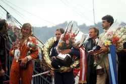 Podium: Vittorio Brambilla, March, race winner, James Hunt, Hesketh, second place, Tom Pryce, Shadow, derde plaats