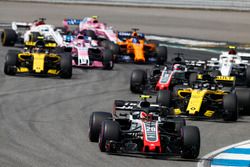 Kevin Magnussen, Haas F1 Team VF-18, leads Nico Hulkenberg, Renault Sport F1 Team R.S. 18, Romain Grosjean, Haas F1 Team VF-18, and Charles Leclerc, Sauber C37