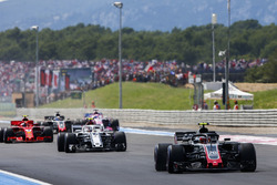 Kevin Magnussen, Haas F1 Team VF-18, leads Charles Leclerc, Sauber C37, and Kimi Raikkonen, Ferrari SF71H