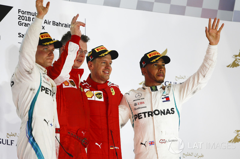 Valtteri Bottas, Mercedes AMG F1, 2nd position, Sebastian Vettel, Ferrari, 1st position, and Lewis H