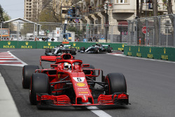 Sebastian Vettel, Ferrari SF71H leads at the start of the race