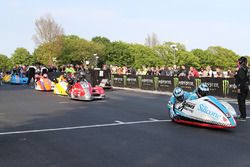 John Holden and Lee Cain take the Isle of Man TT sidecar newcomers on their speed-controlled lap