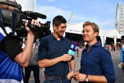 TV Presenter Vernon Kaye, Nico Rosberg in the paddock