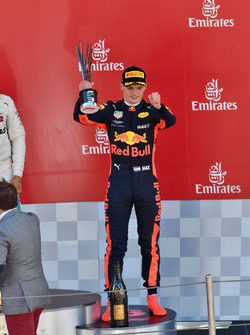 Max Verstappen, Red Bull Racing celebrates on the podium with the trophy