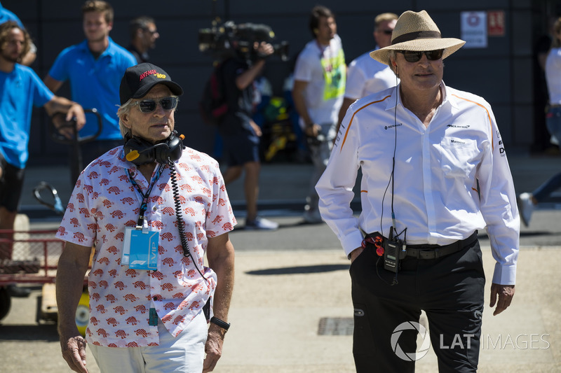 Actor Michael Douglas with Mansour Ojjeh, co-owner, McLaren