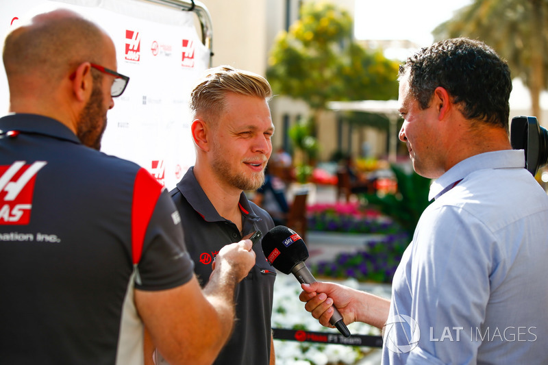 Kevin Magnussen, Haas F1 Team, talks to the media