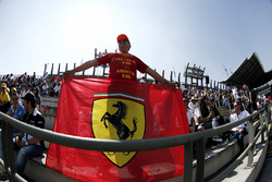 Ferrari fan with ferrari flag