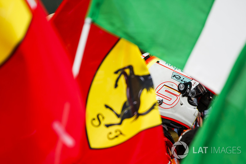 Sebastian Vettel, Ferrari, 1st position, celebrates in Parc Ferme with his team