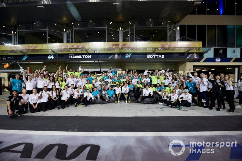 Lewis Hamilton, Mercedes AMG F1, Valtteri Bottas, Mercedes AMG F1, Toto Wolff, Executive Director (Business), Mercedes AMG, and the entire Mercedes team at the track celebrate victory in the race and the Championships