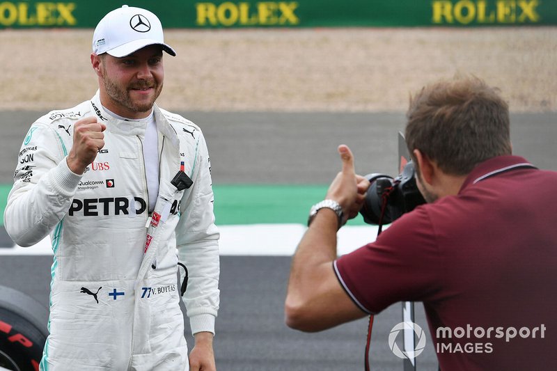 Pole Sitter Valtteri Bottas, Mercedes AMG F1 poses for Glenn Dunbar, Motorsport Images Photographer