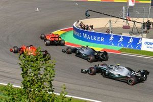 Charles Leclerc, Ferrari SF90, leads Sebastian Vettel, Ferrari SF90, Lewis Hamilton, Mercedes AMG F1 W10 and Valtteri Bottas, Mercedes AMG W10. 