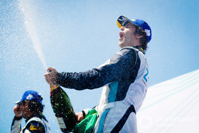 Race winner Sérgio Jimenez, Jaguar Brazil Racing celebrates with the champagne on the podium