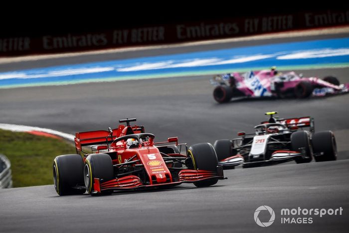 Sebastian Vettel, Ferrari SF1000, Kevin Magnussen, Haas VF-20