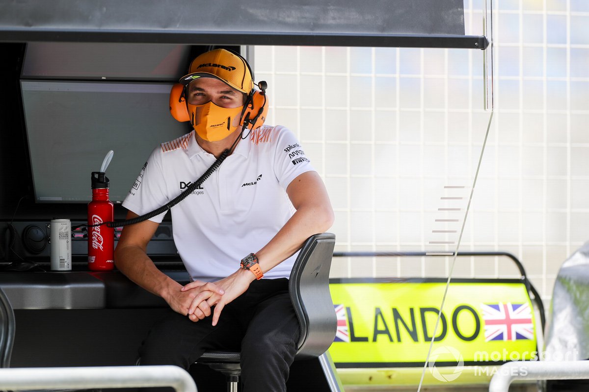 Lando Norris, McLaren on the pit wall
