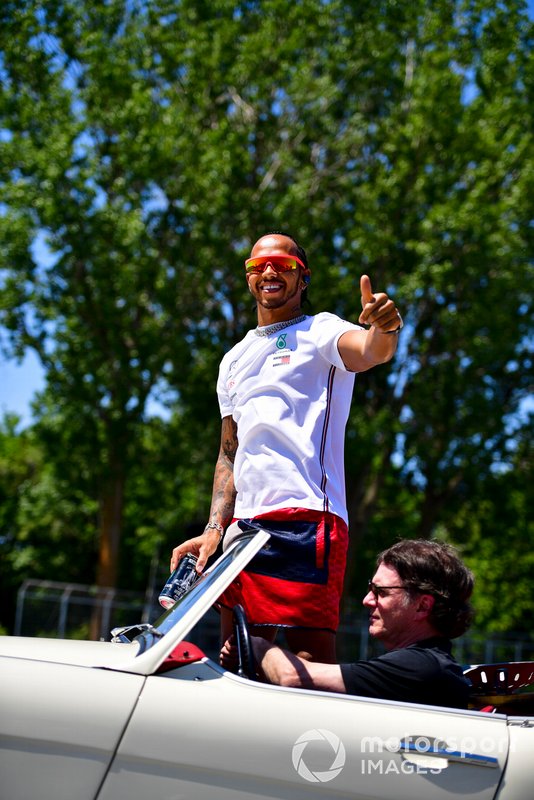 Lewis Hamilton, Mercedes AMG F1, waves to the crowd during the drivers parade