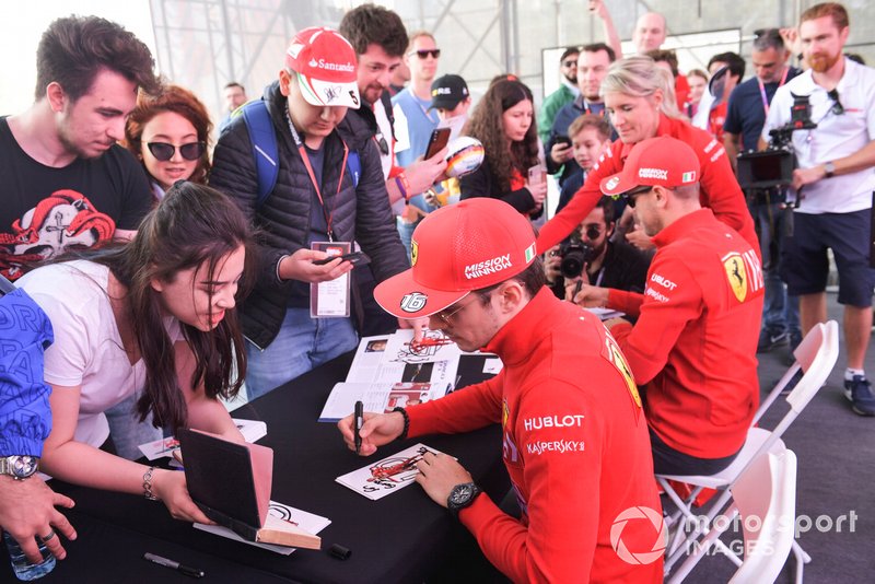 Sebastian Vettel, Ferrari and Charles Leclerc, Ferrari sign autographs for fans