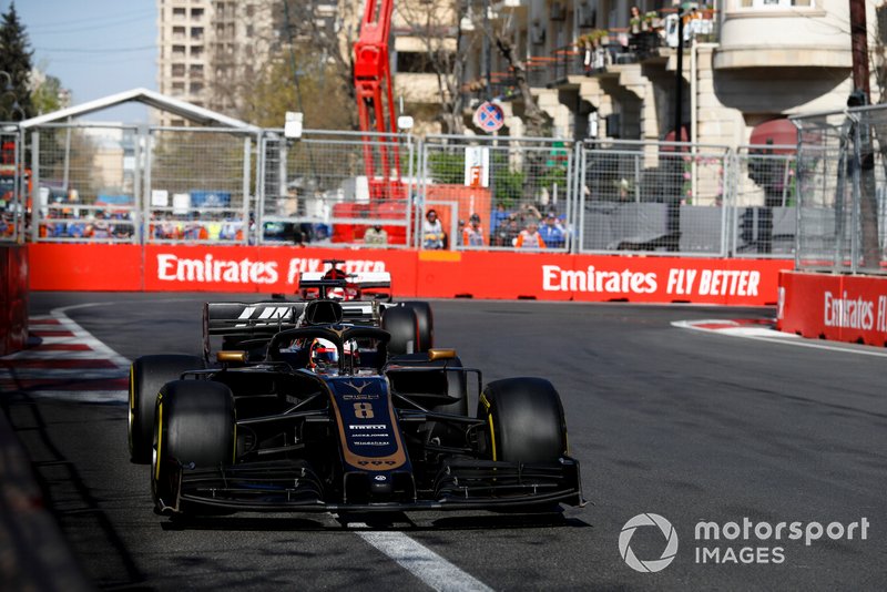 Romain Grosjean, Haas F1 Team VF-19, Kimi Raikkonen, Alfa Romeo Racing C38