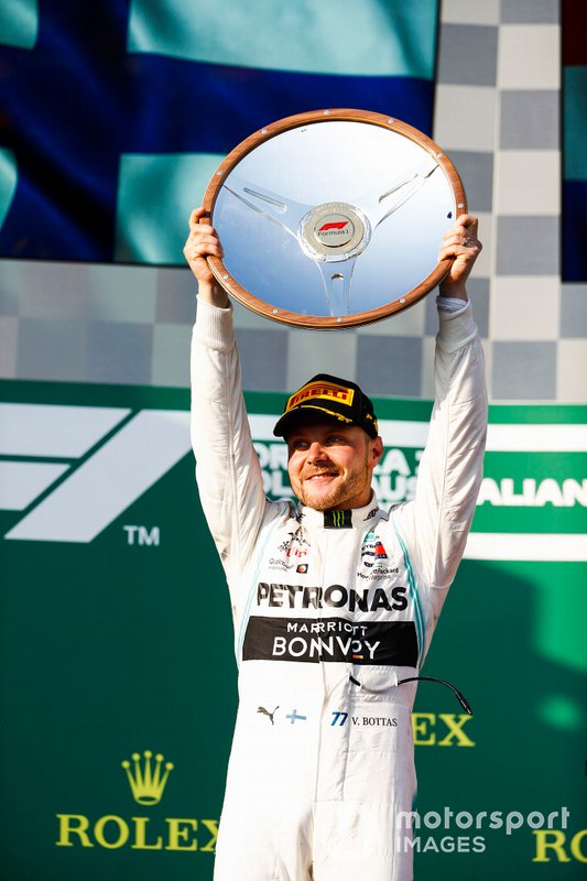 Valtteri Bottas, Mercedes AMG F1, 1st position, lifts his trophy on the podium