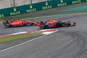 Sebastian Vettel, Ferrari SF90 and Max Verstappen, Red Bull Racing RB15 battle 