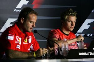 Rubens Barrichello, Ferrari and Kimi Raikkonen, McLaren