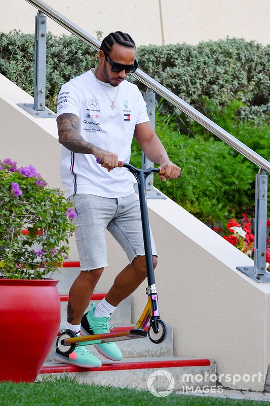 Lewis Hamilton, Mercedes AMG F1 on a scooter in the paddock