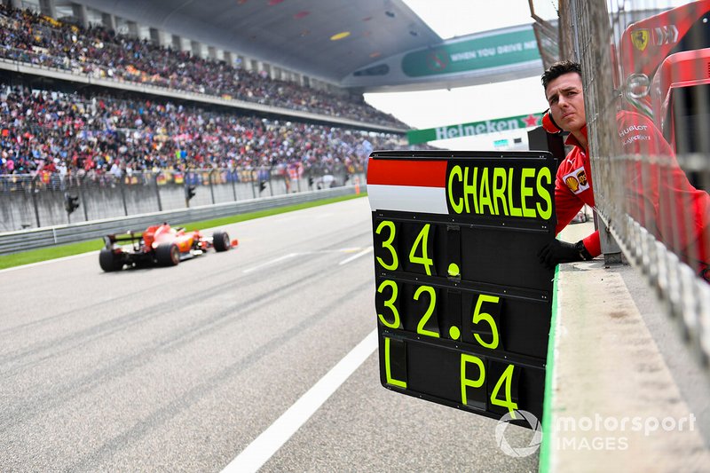 The Ferrari pit board is deployed as Sebastian Vettel, Ferrari SF90, passes