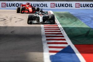 Lewis Hamilton, Mercedes AMG F1 W09, leads Sebastian Vettel, Ferrari SF71H