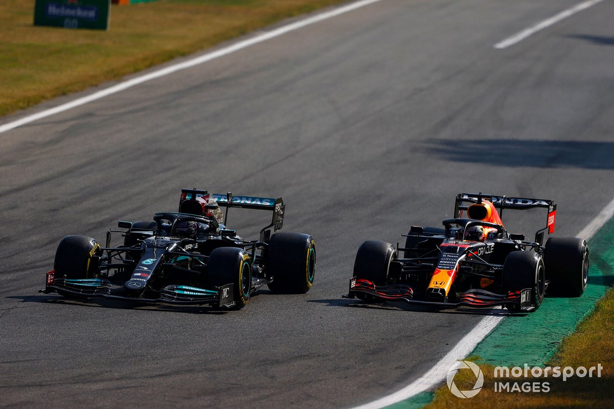 Lewis Hamilton, Mercedes W12, battles with Max Verstappen, Red Bull Racing RB16B