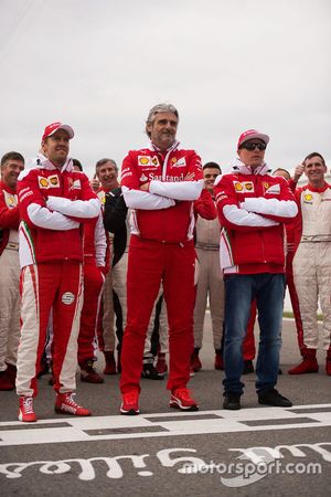 (L to R): Sebastian Vettel, Ferrari with Maurizio Arrivabene, Ferrari Team Principal and Kimi Raikkonen, Ferrari