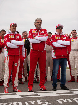 (L to R): Sebastian Vettel, Ferrari with Maurizio Arrivabene, Ferrari Team Principal and Kimi Raikko