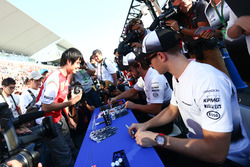 Fernando Alonso, McLaren and Stoffel Vandoorne, McLaren Test and Reserve Driver sign autographs for the fans