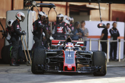 Kevin Magnussen, Haas F1 Team VF-17, exits a pit stop