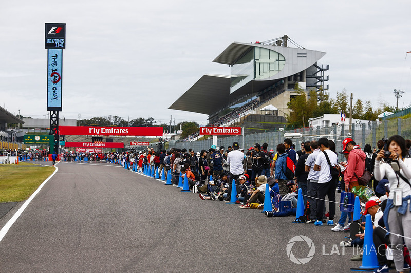 Fans queue on the track