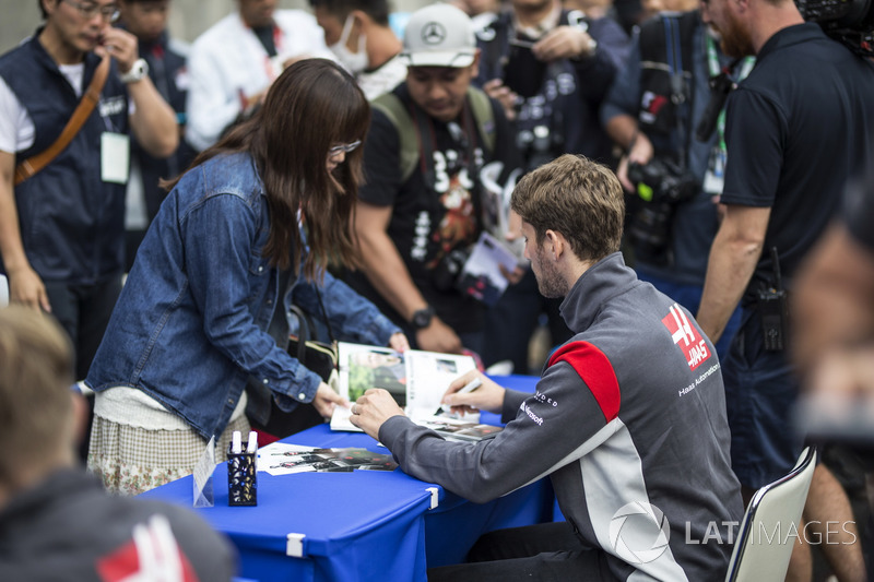 Romain Grosjean, Haas F1 Team signs autographs for the fans