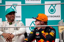 Lewis Hamilton, Mercedes AMG F1 and Max Verstappen, Red Bull Racing celebrates on the podium