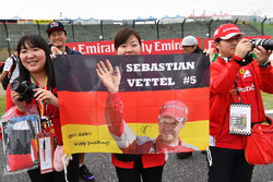 Sebastian Vettel, Ferrari fans and banner