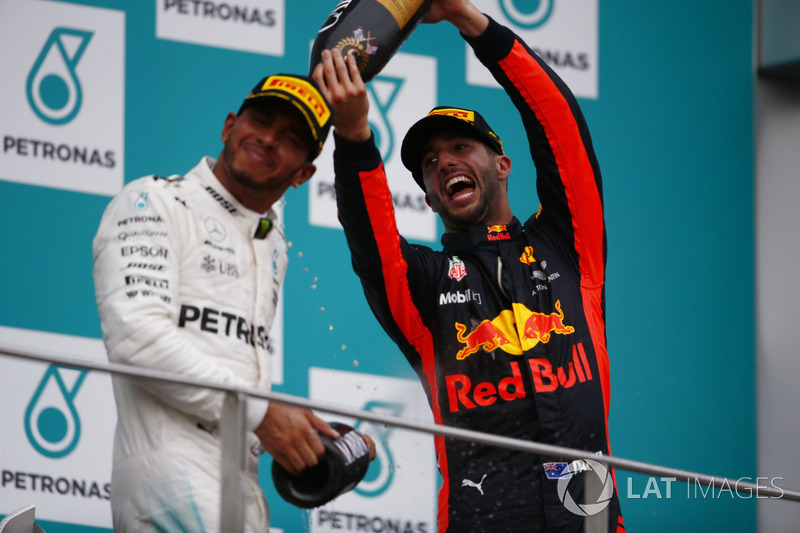 Podium: third place Daniel Ricciardo, Red Bull Racing, sprays champagne over second place Lewis Hamilton, Mercedes AMG F1