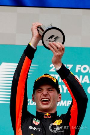 Max Verstappen, Red Bull Racing, race winner, lifts his trophy on the podium