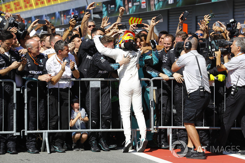 Lewis Hamilton, Mercedes AMG F1, celebrates, his team after winning the race