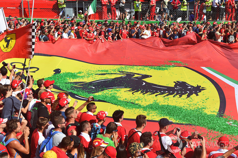 Fans and giant Ferrari flag