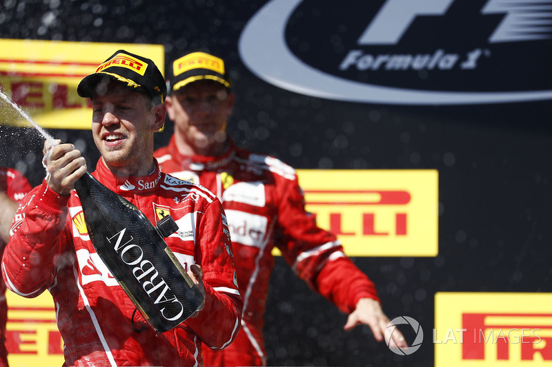 Podio: ganador de la carrera Sebastian Vettel, Ferrari