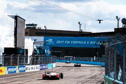 Felix Rosenqvist, Mahindra Racing, leads Lucas di Grassi, ABT Schaeffler Audi Sport, and Nick Heidfeld, Mahindra Racing, across the line to win the race