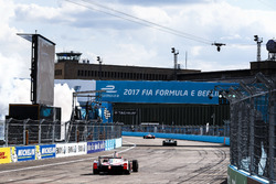 Felix Rosenqvist, Mahindra Racing, leads Lucas di Grassi, ABT Schaeffler Audi Sport, and Nick Heidfeld, Mahindra Racing, across the line to win the race