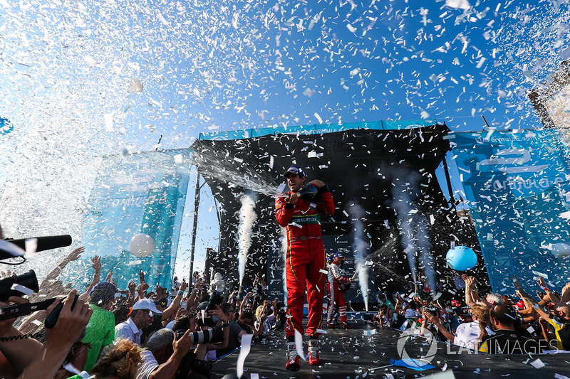 Lucas di Grassi, ABT Schaeffler Audi Sport, sprays the champane as he celebrates on the podium