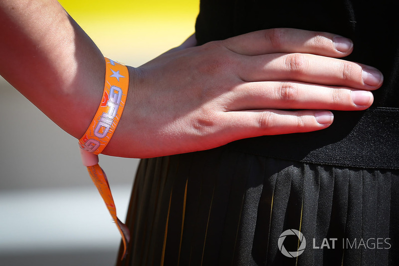 The hand / wrist band of a grid girl