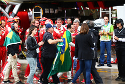Felipe Massa, Williams is applauded by the Ferrari team and joined by his father Luis Antonio Massa